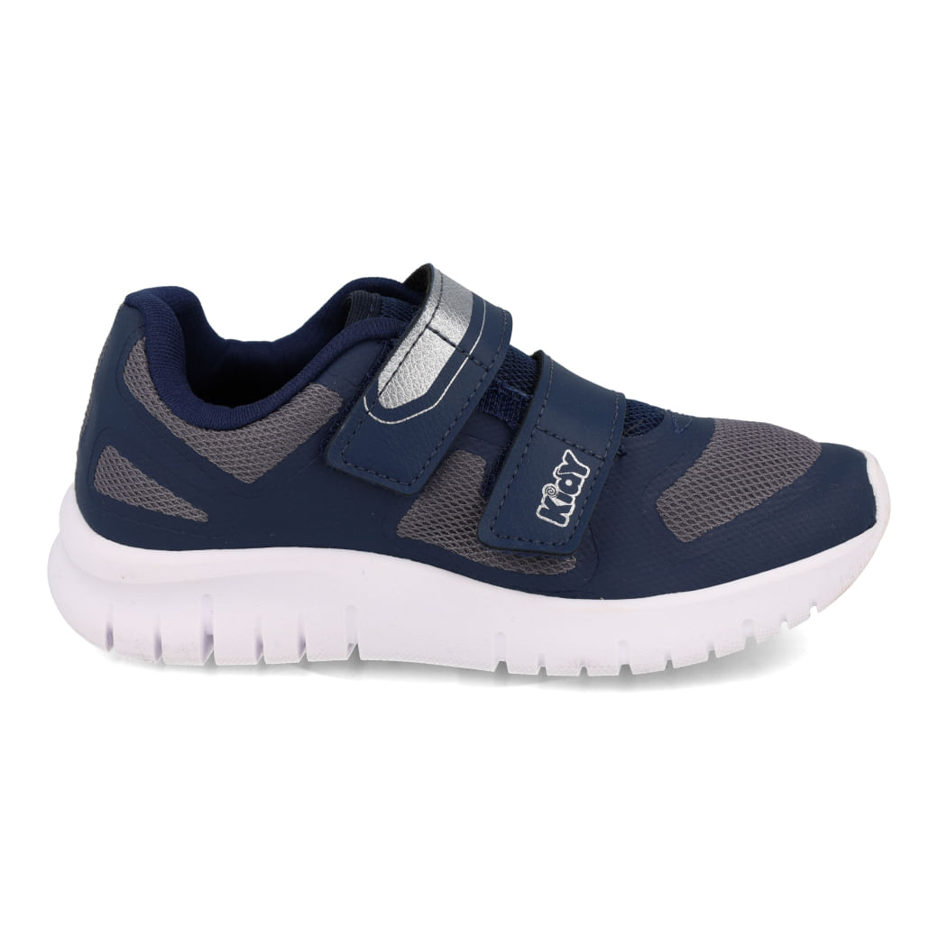 Tênis infantil masculino Kidy casual na cor marinho com detalhes em prata, fechamento em velcro e solado branco anatômico